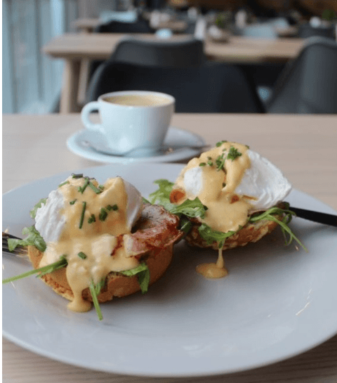 Breakfast with eggs and fresh bread